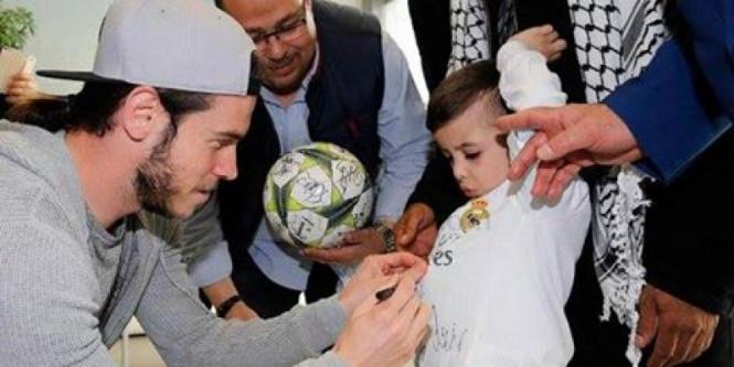 الطفل دوابشه يلتقى كريستيانو رونالدو